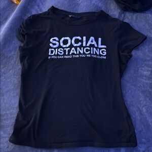 “ Social distancing, If you can read this your to close”
black shirt